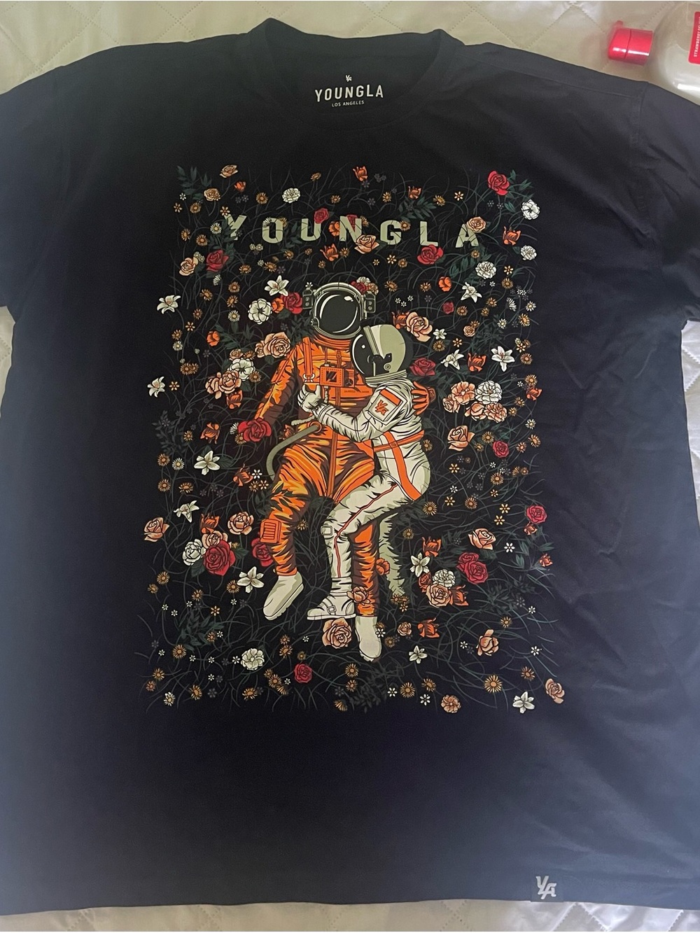 YoungLA Black Tee with Orange & White Astronaut Floral Motif